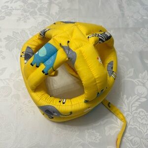 Baby head protector from Simplicity yellow